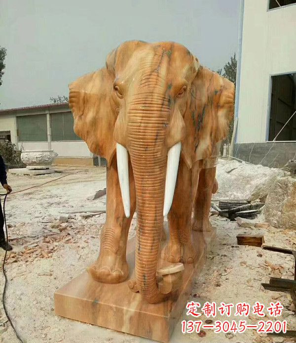 河源鼻卷如意晚霞红招财大象石雕