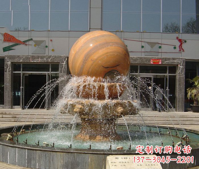 河源石来运转球晚霞红风水球石雕