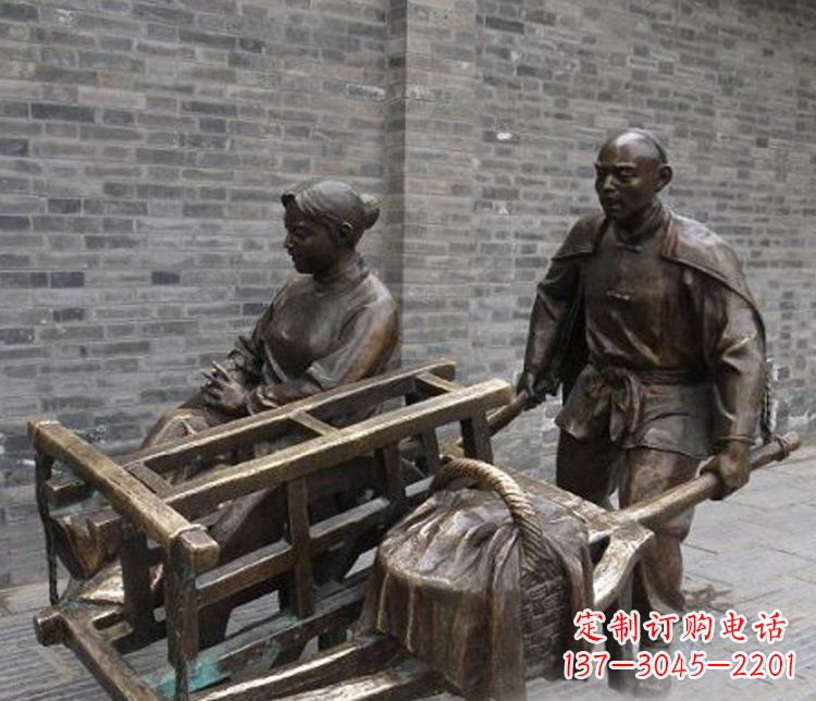 河源推独轮车的人物铜雕