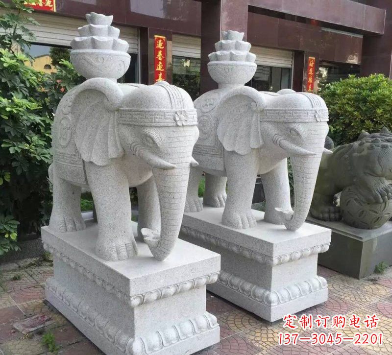 河源驮元宝的大象石雕