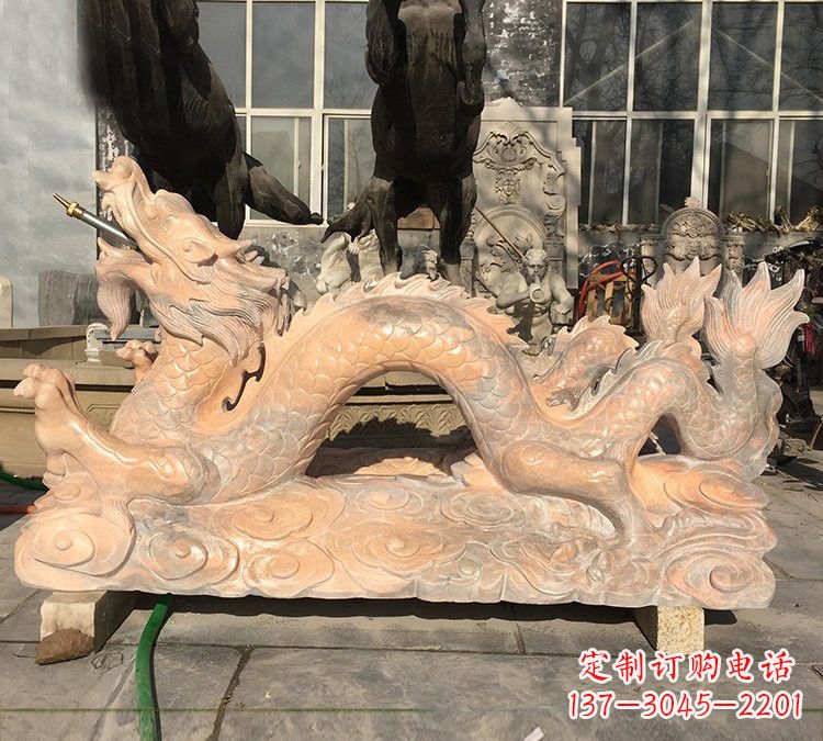 河源晚霞红石雕喷水龙
