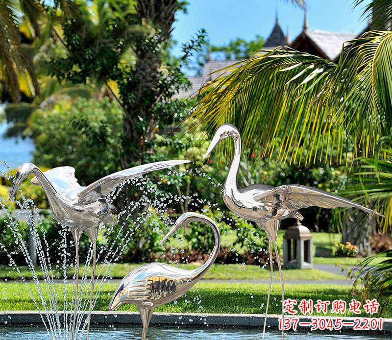 河源鹤雕塑-公园池塘不锈钢镜面抽象喷泉中的鹤雕塑