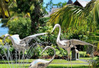 河源鹤雕塑-公园池塘不锈钢镜面抽象喷泉中的鹤雕塑