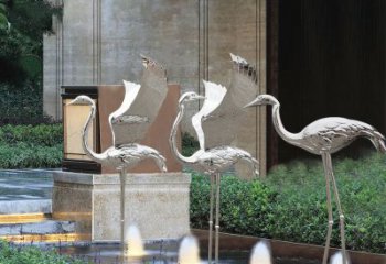 河源鹤雕塑-公园不锈钢镜面喷泉中的鹤雕塑